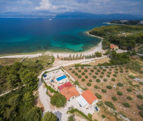 Beachfront House Mir with private pool and jacuzzi right at the beach in beautiful bay in Mirca - Brac